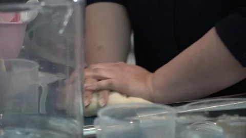 Kneading Dough in the Kitchen Video stock 317472533