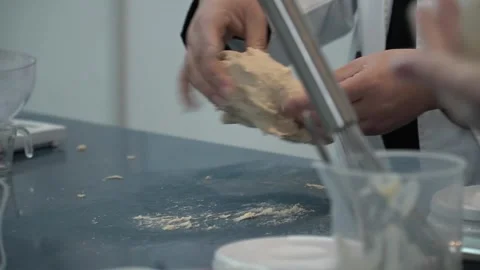 Kneading Dough in a Kitchen Stock Footage 317472534