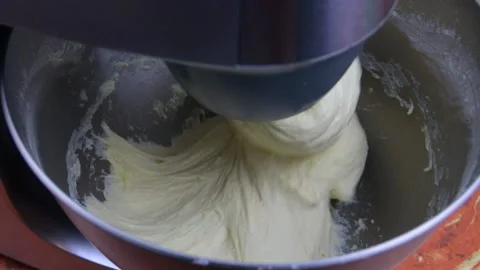 Kneading dough in the modern kitchen machine on a table Stock Footage 169989505