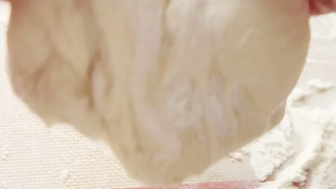 Kneading dough pov Stock Footage 75426802