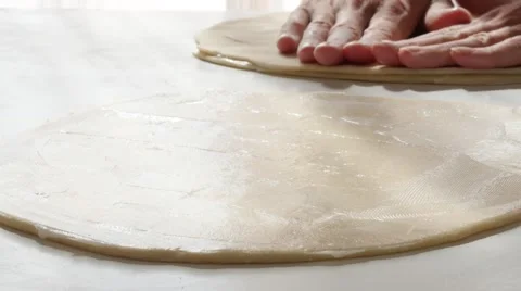 Kneading  dough by professional  on white  table 4K 2160p 30fps UltraHD foota Stock Footage 55655245