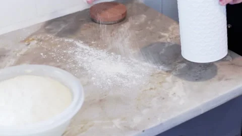 Kneading a dough roll for some pastries Stock Footage 155456530