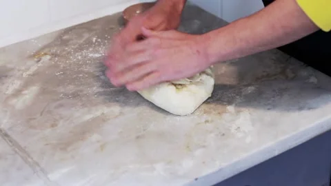 Kneading a dough roll for some pastries Stock Footage 155458147