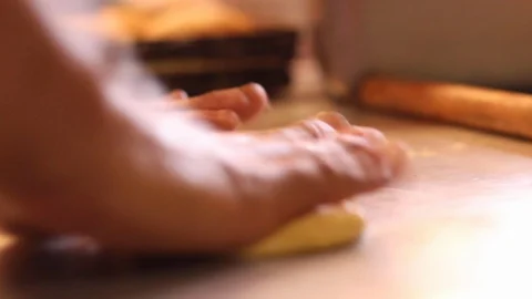 Kneading dough with rolling pin to make sweet bread - 02 Stock Footage 130083531
