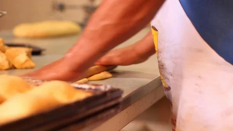 Kneading dough with rolling pin to make empanadas Stock Footage 130084104