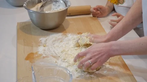 Kneading the dough on the table 스톡 동영상 95831382