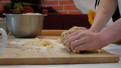 Kneading the dough on the table Stock Footage 95831422