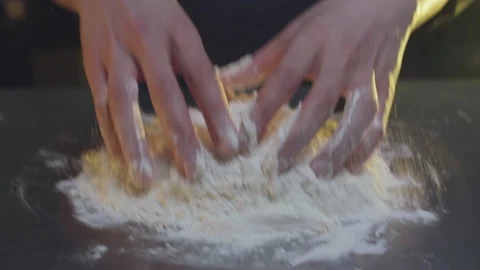 Kneading dough on the table Stock Footage 138582071