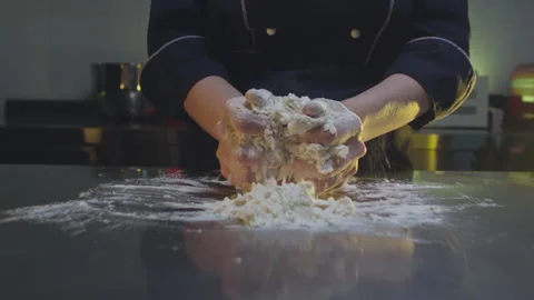 Kneading dough on the table Stock-Footage 138582302