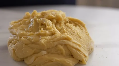 Kneading the dough with your hands. Slow motion Stock Footage 104432974