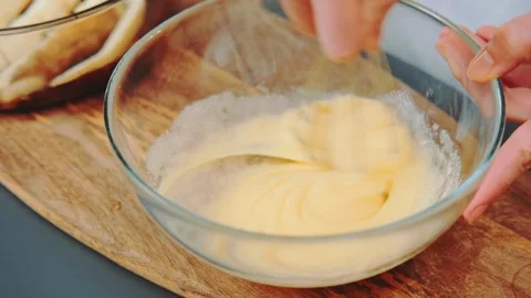 Kneading liquid dough for a pie. Video stock 252453682