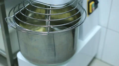 Kneading machine mixing a dough in a restaurant Video stock 65178952