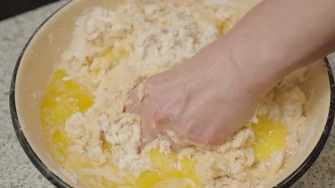 Kneading, making dough for buns or pizza. Stock Footage 166501842