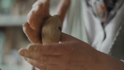 Kneading a piece of clay Stock Footage 218604226
