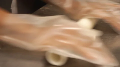 Kneading with rolling pin Stock Footage 60633926