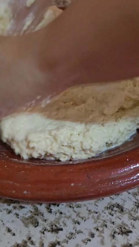 Kneading Traditional Moroccan Bread Dough for Batbout Close Up Stock Footage 341675447