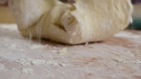 Kneads dough in flour 스톡 동영상 80041641