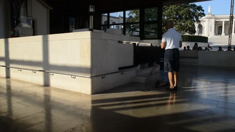 Knee walking devoted pilgrims at the Sanctuary of Fatima, Portugal Stock Footage 95809595