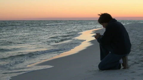Kneeling Prayer At Sunset Stock Footage 662126
