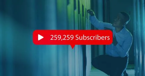 Kneeling tech in shirt checking server rack in data center, with subscriber Stock Photos