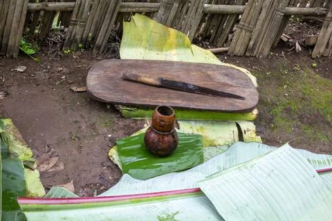 Knife and board for making false banana bread, Gamole, Ethiopia Stock Photos