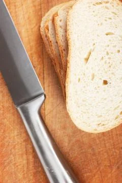 Knife and bread Stock Photos