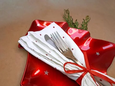 Knife and fork on the plate for dinner , decorated for Christmas Stock Photos