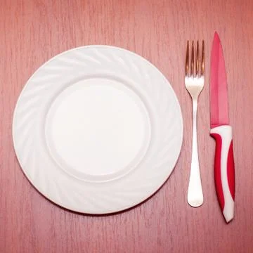 Knife and fork with plate Stock Photos