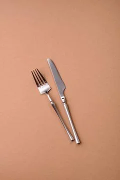 A knife and fork, silver kitchen utensils for the dining table. A knife and.. Stock Photos