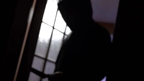 The Knife Armed Robber has Crept into Your Home Stock Footage 147851408