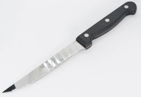 Knife with black plastic handle Stock Photos