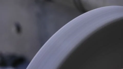 Knife blacksmith working in his knife workshop. Stock Footage 195740651