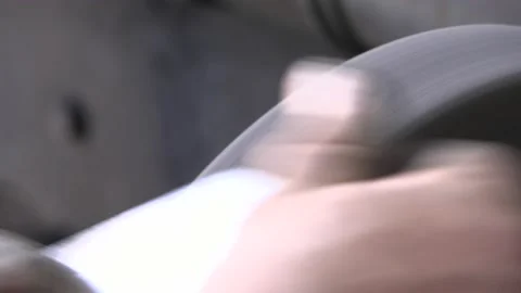 Knife blacksmith working in his knife workshop. Stock Footage 195741807