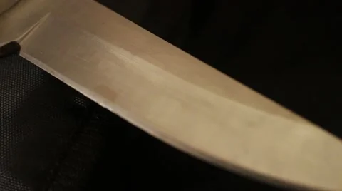 KNIFE BLADE - Medium Macro Dolly Move along the Cutting Edge Stock Footage 51020731