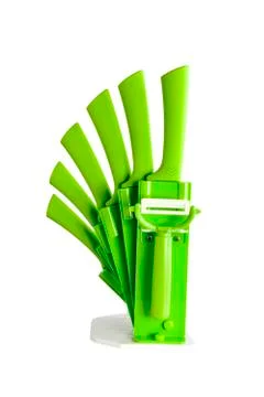Knife block with 6 different green knives and peeler Stock Photos