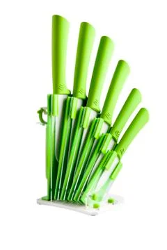 Knife block with 6 different green knives and peeler Stock Photos