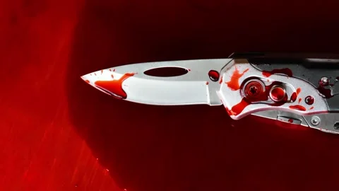Knife in a  blood and camera flashes.Forensic investigation. Stock Footage 304896716