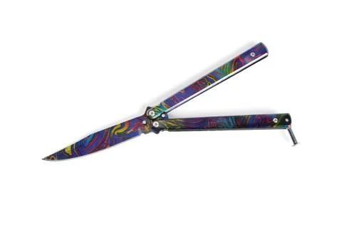 Knife butterfly multicolor color white background close up Stock Photos