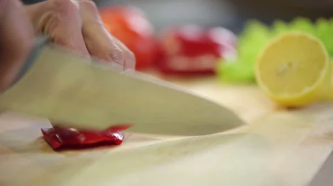 Knife chops red paprika Stock Footage 68088799