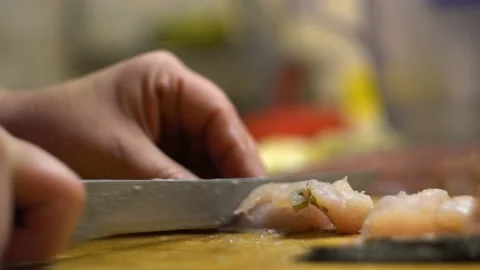 Knife cut the fish on the Board 4K Video stock 102448753
