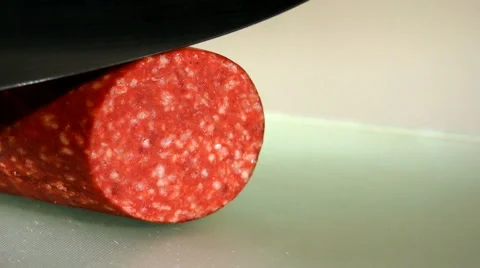 Knife cut slice from sausage Stock-Footage 67616827