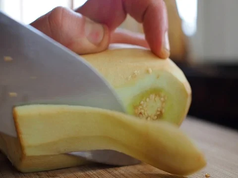 Knife cut zucchini ion board Stock Footage 82012259