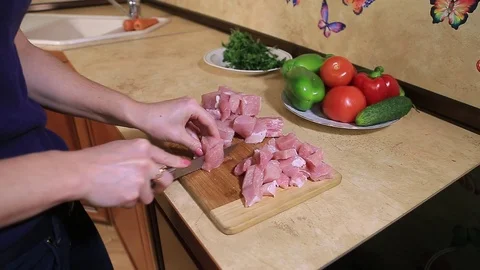 Knife cuts meat Stock Footage 100986754
