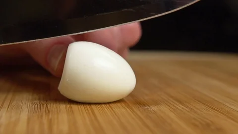 A knife cuts the quail egg. Slow motion 스톡 동영상 72500466