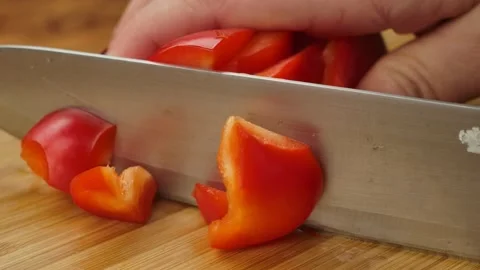Knife cuts red pepper into cubes Stock-Footage 229268218