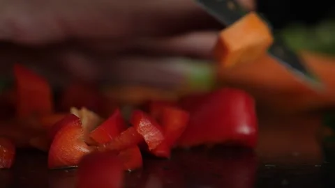 Knife that cuts a red pepper Stock Footage 137211289
