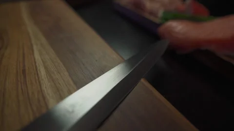 KNIFE ON CUTTING BOARD Stock Footage 280367243