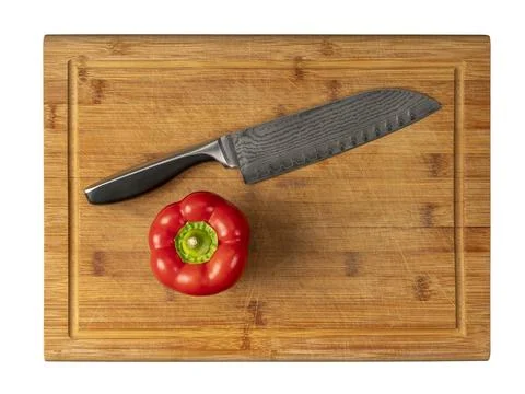 Knife on cutting board Stock Photos