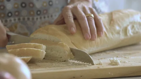 Knife Cutting Bread Stock Footage 169535206