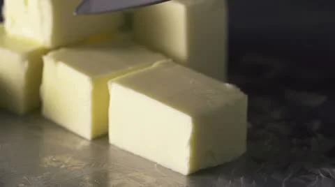 Knife cutting butter Stock Footage 21653243